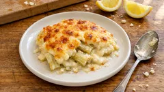 Gratinované kard y s bešamelem a sýrem: krémové vrstvy a zlatá kůrka z trouby